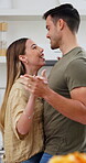 Love, dance or couple in house with fun, romantic moment or bonding together on weekend break. Partner, groove or people in home with embrace, rhythm or playful connection in happy relationship.