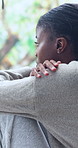 Sad, depression and black woman by window in home with bad news, breakup or panic attack. Mental health, upset and African female person with disappointment, frustration or overwhelmed in house.