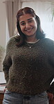 Smile, relax and face of woman in home for confidence, peace and stress relief on weekend break. Happy, wellness and positive attitude with female person in apartment for pride, calm and self care