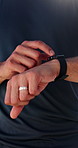 Fitness, man and hands typing with smart watch for heart rate tracker, exercise and check wellness. Flare, male person and runner with wearable tech for cardio training, monitor step count and timer.