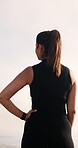 Thinking, runner and back of woman in nature for workout break, fitness vision and reflection. Exercise rest, perspective and wellness with person outdoor for health, endurance training and self care