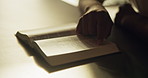 Hands, reading and person with bible for worship, guidance and verse for spiritual understanding. Holy, book and pointing for learning scripture, religious education and sermon preparation with faith