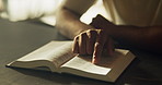 Hands, christian and person reading with bible, guidance and verse for spiritual understanding. Holy, book and pointing for learning scripture, religious education and sermon preparation with faith
