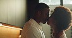 Kissing, moment and love with black couple in kitchen of home together for bonding or security. Affection, hugging and laughing with happy people in apartment for connection, morning or trust