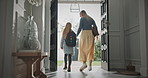 Doors, home and mother with child leaving for school and work in morning for commuting together. Bags, goodbye and back of mom walking with girl student for education and career in apartment.