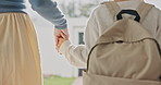 Mother, child and holding hands in home with backpack, departure or back to school for education. Woman, daughter and walk to leave house with bag, morning routine or support for learning development