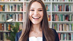 Laughing, face and woman with pride in library, knowledge and creative for publishing career growth. Happy, literary agent and person with talent representation job, confident and opportunity in USA