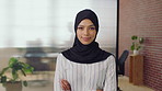 Muslim woman, face and arms crossed with hijab in office, pride and smile at startup company. Islamic person, traditional scarf and portrait with religion, faith or space at creative agency in Kuwait