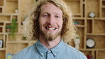 Business, face or man with laugh in office for creative internship, publishing industry or about us. Intern, person and happy at agency for personal growth, career development and writing experience