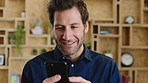 Man, phone and smile with typing at startup, communication or check notification at office. Mature person, happy and texting on mobile app, contact and scroll on social network at creative agency