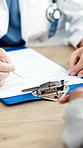 Hands, doctor and patient with paperwork in hospital, medical consultation and writing prescription. Appointment, clipboard and people with referral for specialist follow up, health survey and report