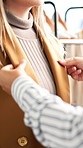 Woman, tailor or hands with customer for fashion styling, assistance or fitment in clothing store. Female person, client or seamstress helping with outfit for custom design, fabric or comfort in shop