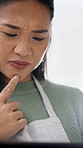 Cooking, thinking and Asian woman on tablet for recipe, online instruction and meal ideas. Home, kitchen and person on tech for research, tutorial and inspiration on culinary website or food blog