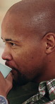 Sofa, happy or black man watching tv with coffee in home for fun entertainment or comfort. Relax, male person or drinking caffeine with smile or mug for online subscription, movie or network in house