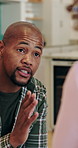 Dad, child and talk with discipline in home, advice and guide for learning, choice or rules in kitchen. African people, father and chat with kid for insight, instruction and explain at family house