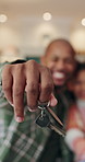 Keys, happy and hands of family in new home for real estate, bonding or property investment. Love, mortgage and child with parents for milestone with house purchase together for connection on weekend