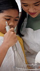 Baking, mother and child with mixing flour in home for cake recipe, instructions and development. Bonding, mom and girl kid with ingredient preparation for dessert process, teaching skills and help