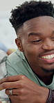 Talking, happy and black couple in bedroom with popcorn, streaming and watching movie together. Dating, love and man with woman with snack, conversation and bonding with series on weekend in home