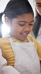 Smile, family and baking in home with child, learning and culinary skills for homemade cookies. Happy, people and teaching kid at house with tablet, online recipe and supervision for handmade treats
