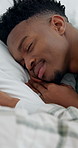 Relax, sleeping and man with woman in bed for tired, rest and peaceful morning in bedroom. Cozy, pillow and couple with blanket on lazy weekend for dreaming, fatigue or comfortable break in home