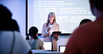 Woman, tablet and lecture with board at college with class, happy and coding course for education. Person, IT professor and students with tech, learning and screen for programming in university hall