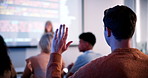 Students, lecture and raised hand in classroom at college, talk and coding course for education. Person, IT professor and questions with tech, learning and screen for programming in university hall