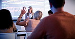 Students, teacher and raised hand in classroom at campus, talk and coding course for education. Person, IT professor and questions with tech, learning and screen for programming in university hall