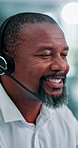 Smile, business and black man at call center with headset, consultation and advice for customer service. Mature person, talking and agent in office with mic, assistance and telecom for client inquiry