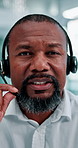 Headset, video call and face of black man in office with online meeting for finance proposal. POV, mic and portrait of mature financial manager on discussion for investment approval in workplace.