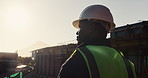 Architect, thinking and black man with helmet on construction site for building safety or security. Male person, contractor or civil engineer with hard hat for architecture, infrastructure or project