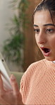 Surprise, shock and woman with phone in home for texting, networking or communication on mobile app. Technology, bad news and female person with cellphone for contact or chatting in living room