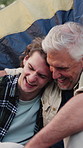 Camping, man and hug senior father, laughing and bonding together with family on vacation outdoor. Tent, adult son and embrace with elderly parent for happiness, funny joke and connection on holiday