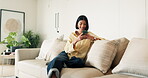 Laugh, text message or woman in home with phone, online communication and comic post on social media. Happy, digital or person in house with tech, funny conversation and meme reaction on chat app.