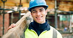 Construction, face or man on site with wooden plank, positive attitude or pride as industrial worker. Happy, portrait or engineer with material, about us and confidence in architecture industry.
