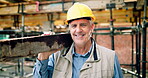 Construction, face or man on worksite with plank, positive attitude or pride as industrial worker. Happy, mature person or engineer with wood material, about us or confidence in architecture industry