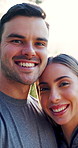 Fitness, face or couple with smile in nature for outdoor workout, exercise or training together. Portrait, happy man or woman with hug or embrace in forest or woods for connection, health or wellness