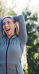 Fitness, woman and laugh with stretching at park to start exercise, muscle preparation and talking. Funny, athlete and happy with arm warm up outdoor for morning cardio, getting ready or conversation