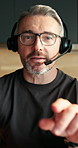 Video call, face and man with headset in kitchen, freelance or investment update for contact in home. Virtual assistant, remote work and mature person with mic, talking and financial advice in house