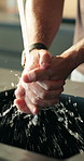 Washing hands, man and kitchen tap for hygiene, wellness and health with disinfection in home. Process, person and cleaning bacteria or dirt with splash, liquid and remove germs with morning routine