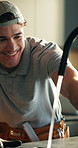 Plumber, maintenance and repair tap in kitchen with gloves, man check running water or job success. Happy, person and plumbing tools in home with faucet installation, renovation project or DIY skills