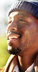 Hiking, mindfulness and man with smile in nature, breathing and thinking on peaceful holiday or trip. Hiker, laughing and black person with memory, fresh air and reflection on vacation and adventure