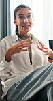 Speaking, therapy and woman in counseling office, share experience or story for addiction recovery. Psychology, mature person and talk in consultation, alcoholic rehabilitation or relapse prevention