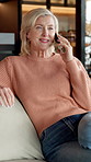Laughing, phone call and relax with senior woman on sofa in home living room for conversation. Communication, talking and thinking with funny old person in apartment for break, retirement or wellness
