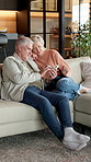 Mature, couple and phone on home sofa for online browsing, social media and internet connection. Happy man, woman and smile with technology to scroll, mobile app or streaming on living room couch