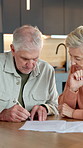Old couple, writing and document in home with contract, signature and statement for finance loan. Senior people, review and paperwork at house with agreement, financial deal and letter for retirement