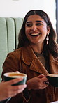 Coffee, drinking and girl friends in cafe with relax, calm or peaceful morning on holiday or break. Scent, smell and women with warm beverage or cappuccino aroma in restaurant or diner on vacation.