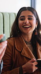 Coffee, talking and girl friends in cafe with relax, calm or peaceful morning on holiday or break. Scent, conversation and female person with warm beverage or cappuccino aroma in restaurant or diner.