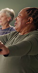Senior, stretching and women with resistance band for health, wellness and exercise for mobility. Retirement, trainer and people with equipment for movement, strength training and muscle workout