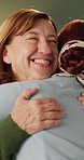 Mental health, therapy or old woman in center with hug, empathy or evaluation with support. Senior person, patient or therapist in office with embrace, sympathy or understanding in counseling session