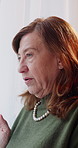 Thinking, sad or old woman in house with memory, loss or disappointment in past mistake. Mental health, flashback or senior person in home with reflection, emotional fatigue or regret in retirement.
